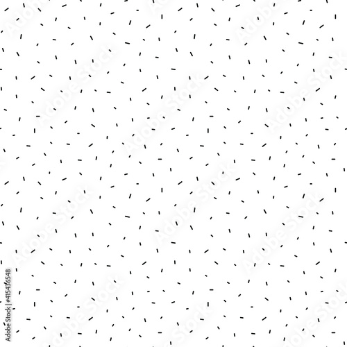 Tiny sprinkle seamless pattern. Black chaotic sticks isolated on white. Repeatable minimalist background.