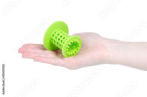 Bath rubber stopper in hand on white background isolation