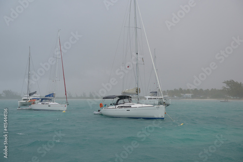 Obraz na plátně Sailboats at anchor during a squall, Anegada, British Virgin Islands