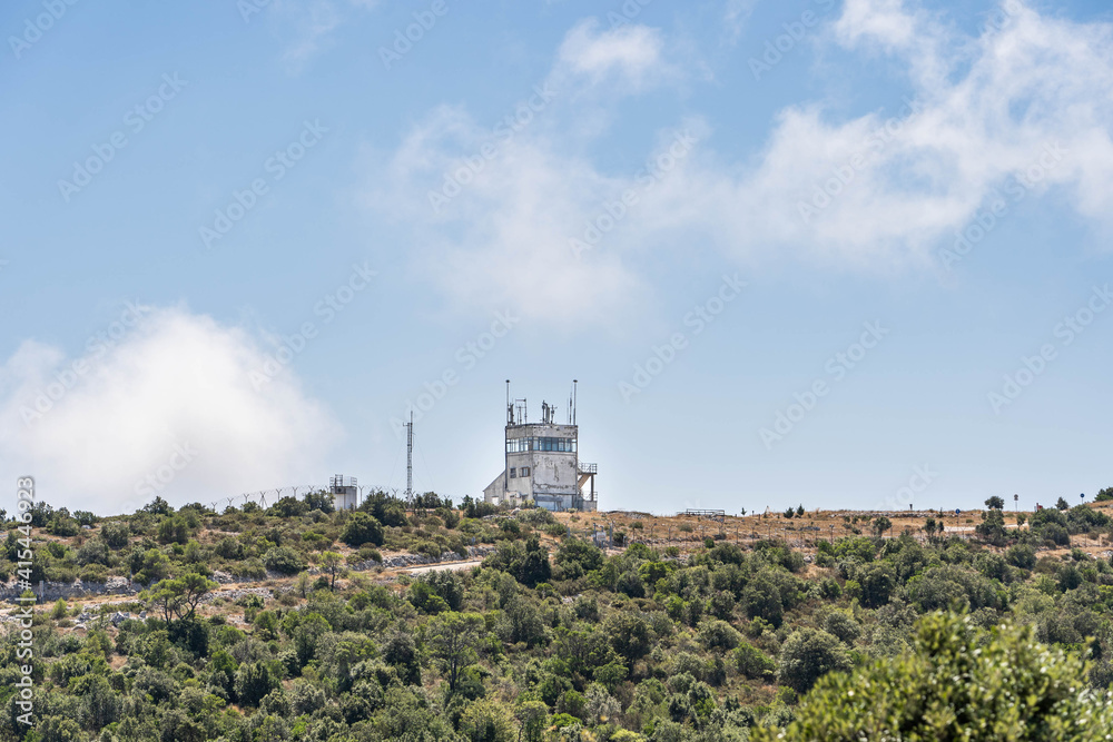 Buiilding with radio on top of Mount Hum in Komiza on Vis Island in Croatia summer