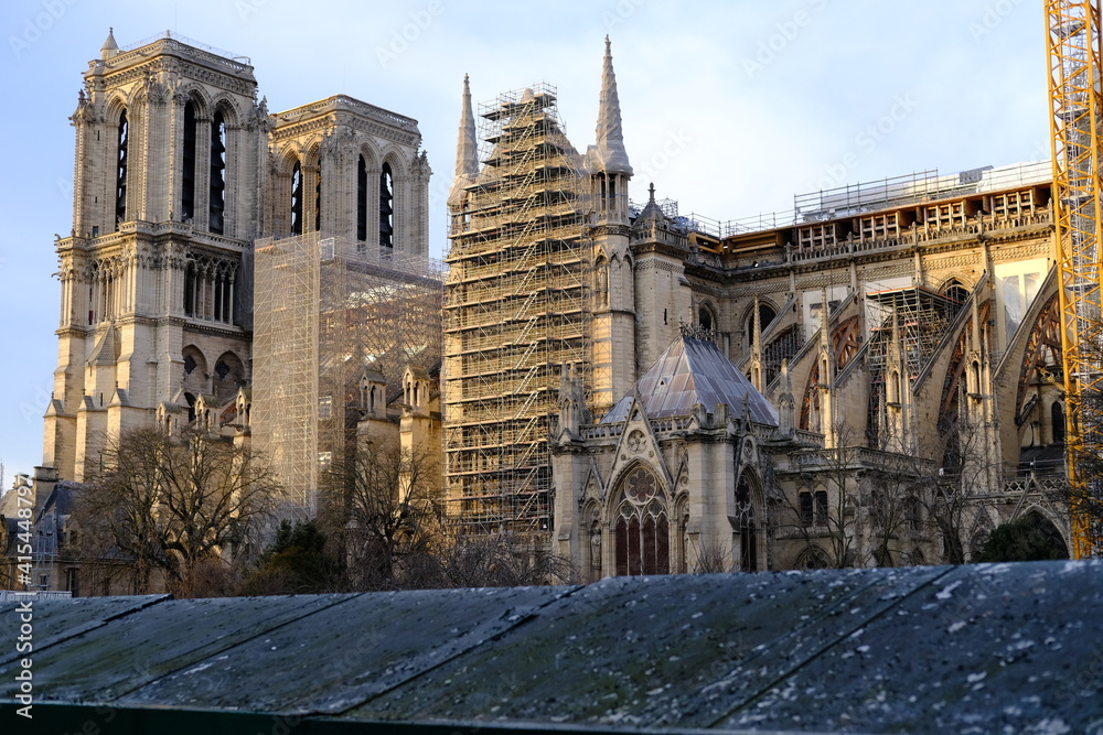 The 20th February 2021, the scaffoldings and the yellow crane of Notre Dame de Paris during reconstruction work.