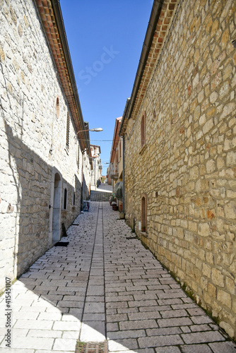 An alley between the old stone houses of Castelpagano  a medieval village in the province of Benevento.