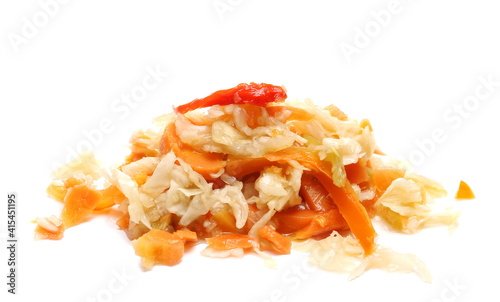 Pickled sour vegetables mix salad, carrot, cabbage, paprika and cucumber background, winter stores 