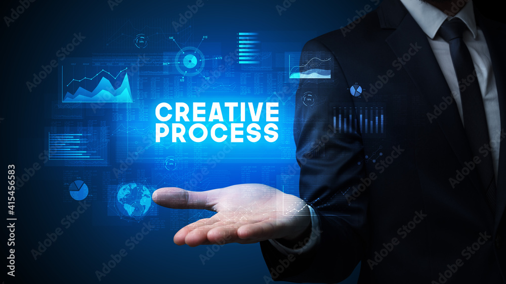Hand of Businessman holding CREATIVE PROCESS inscription, business success concept Hand of Businessman holding CREATIVE PROCESS inscription, business success concept