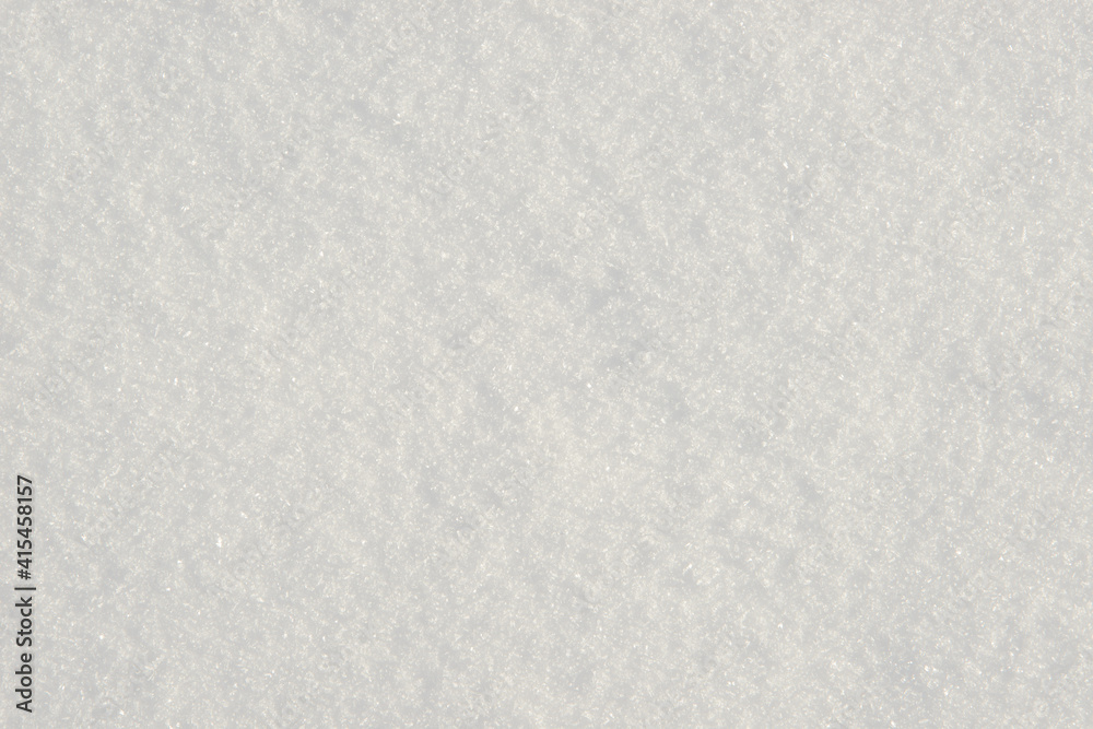 Obraz premium Fresh clean white snow background texture. Winter background with snowflakes and snow mounds. Snow lumps. Seasonal landscape details.