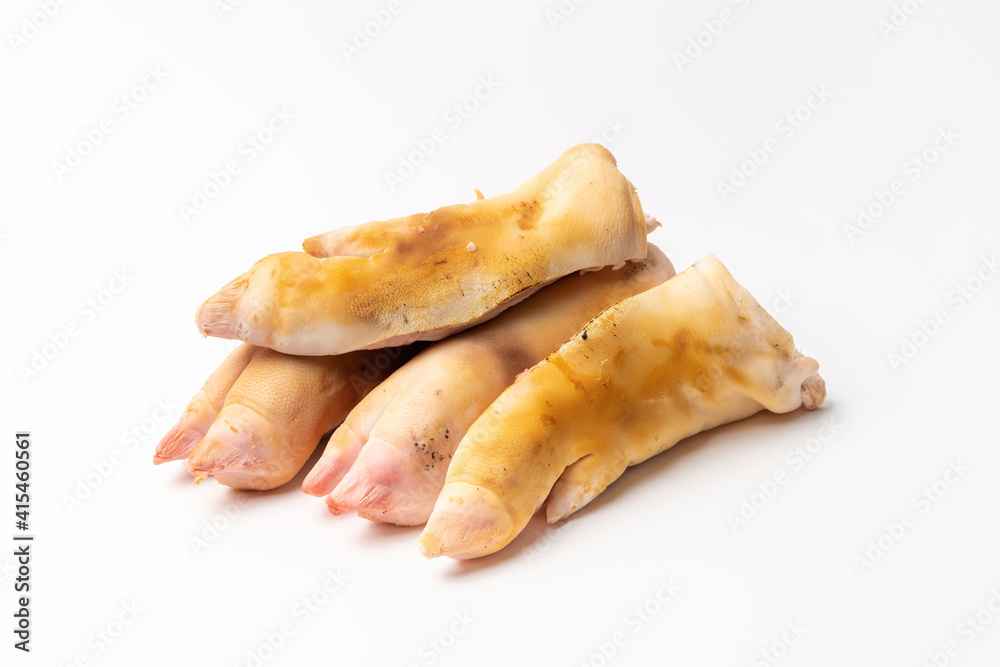 Half-raw pig’s feet on a pure white background 스톡 사진 | Adobe Stock