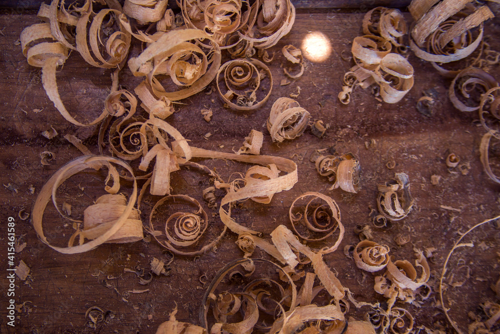 Wood shavings on the carpenter's : woodworking and carpentry concept