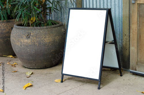 Foto Blank white outdoor advertising stand or sandwich board mockup template