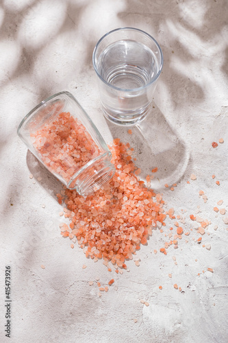 pink himalayan salt, in bowl on white background photo