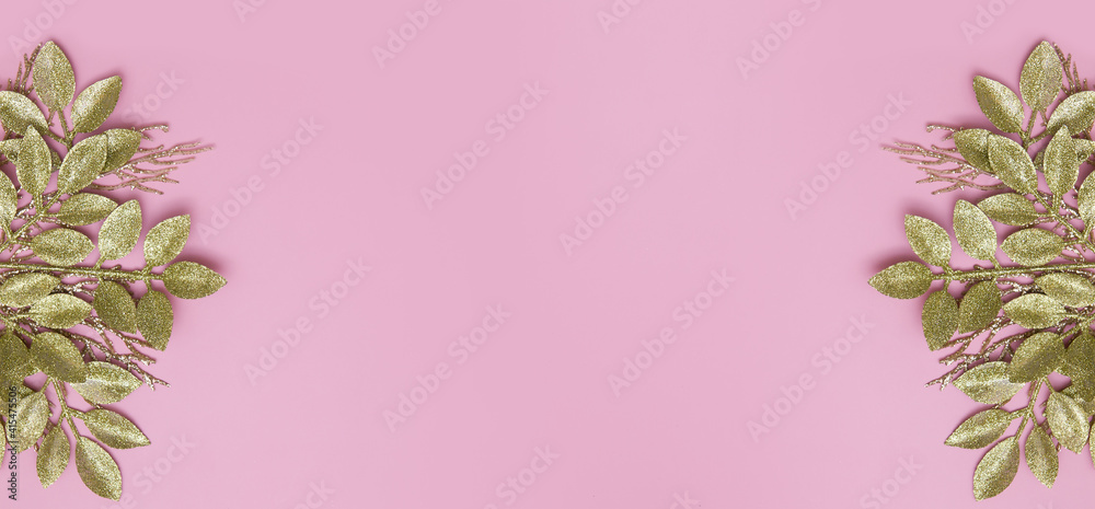 Floral banner with golden branches on a pink background copy space Floral banner with golden branches on a pink background copy space