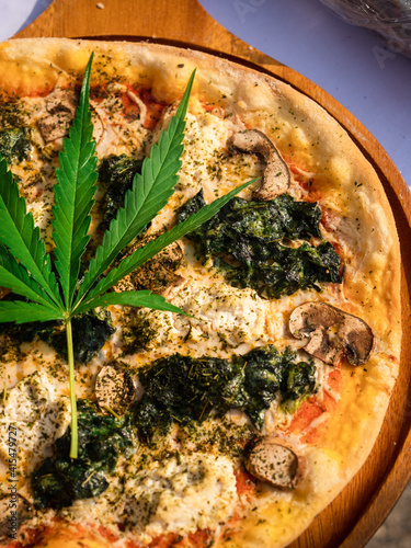 Pizza mix with marijuana or cannabis leaves.