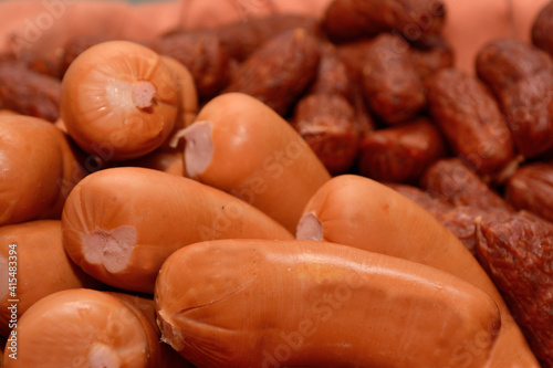 Two Different Types Of Sausage In Large Quantity