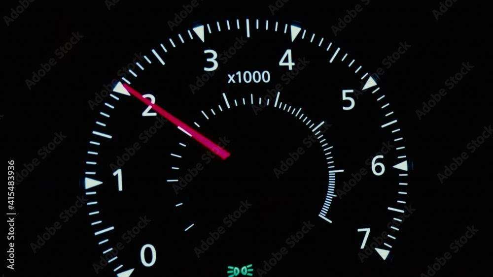 Close up shot of a speedometer in a car in motion. Close up shot of a speedometer in a car in motion.