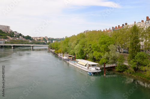 Rhone river and boats from Pont Morand photo