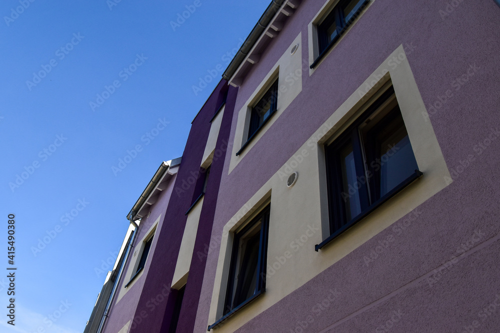 facade of a lilac purple coloured building