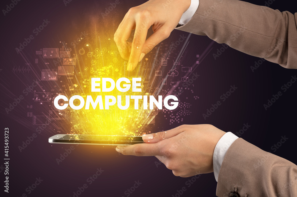 Close-up of a touchscreen with EDGE COMPUTING inscription, innovative technology concept Close-up of a touchscreen with EDGE COMPUTING inscription, innovative technology concept