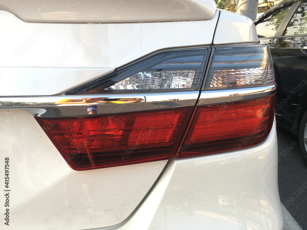 Modern car tail light. Red modern car back light.closeup shot.

