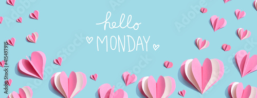 Hello Monday message with pink paper hearts - flat lay