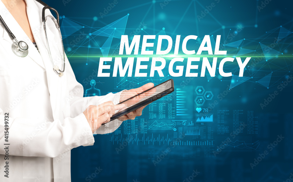 doctor writes notes on the clipboard with MEDICAL EMERGENCY inscription, medical diagnosis concept