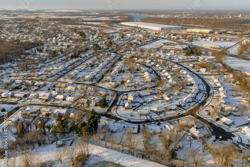 Fototapeta Naklejka Na Ścianę i Meble -  After snowy winter on the residential streets after the snow of a small town