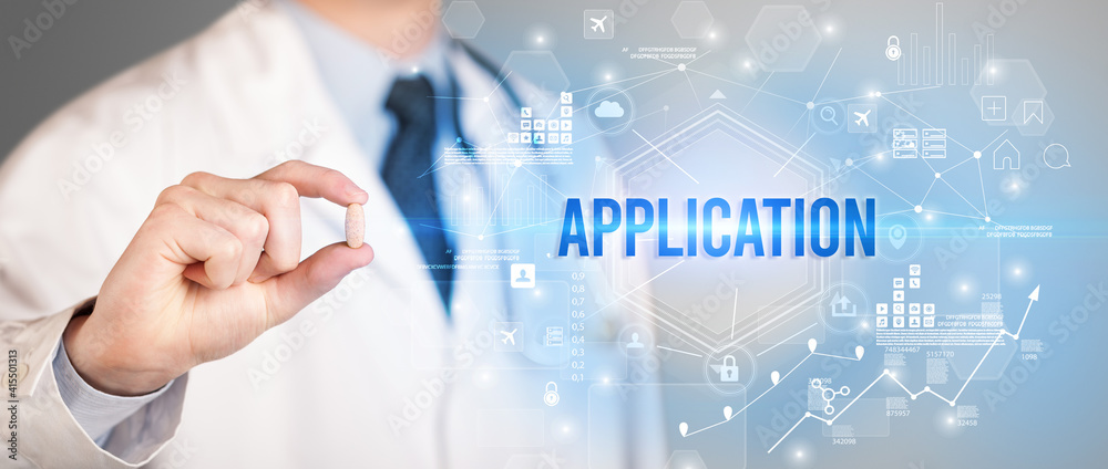 Doctor giving a pill with APPLICATION inscription, new technology solution concept Doctor giving a pill with APPLICATION inscription, new technology solution concept
