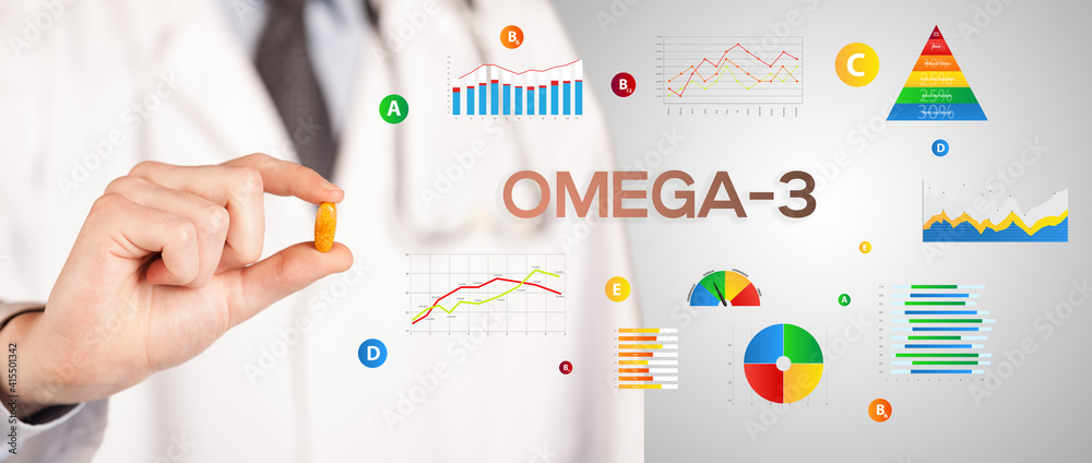 Nutritionist giving you a pill with OMEGA-3 inscription, healthy lifestyle concept Nutritionist giving you a pill with OMEGA-3 inscription, healthy lifestyle concept