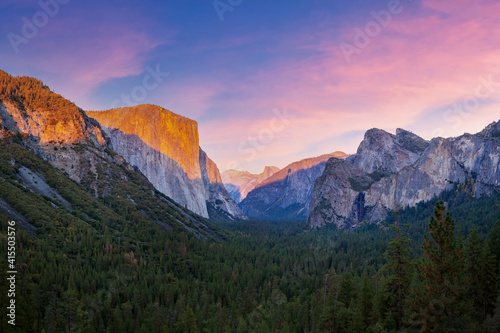Yosemite valley nation park during sunset view from tunnel view on twilight time. Yosemite nation park, California, USA. Panoramic image.