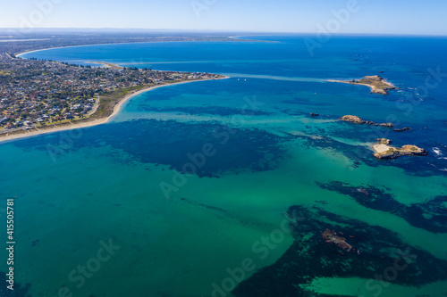 Aerial view of coastline at Point Peron with Penguin and Seal Island at Rockingham, Western Australia