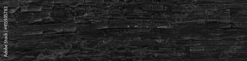 Картината върху платно Dark black background of rough burnt wood, soot, and ash