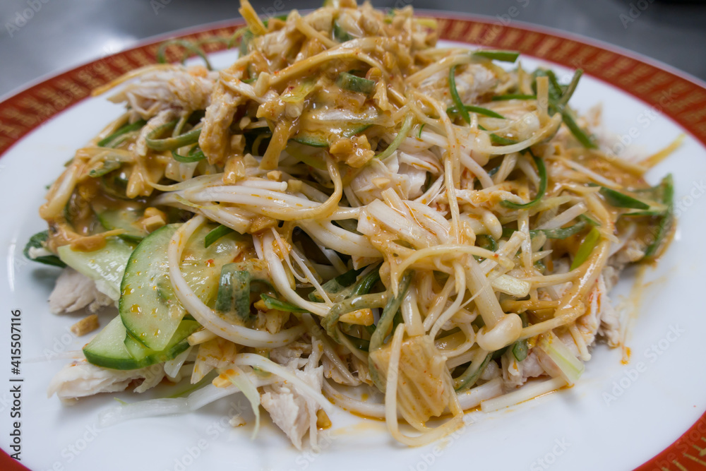 Chicken breast and green onion Peanut sauce salad.