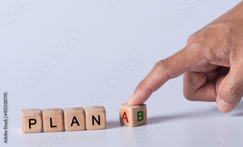 hand holding dice with text for illustration of 