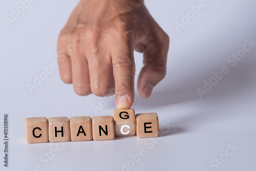 hand holding dice with text for illustration of "change and chance" words 