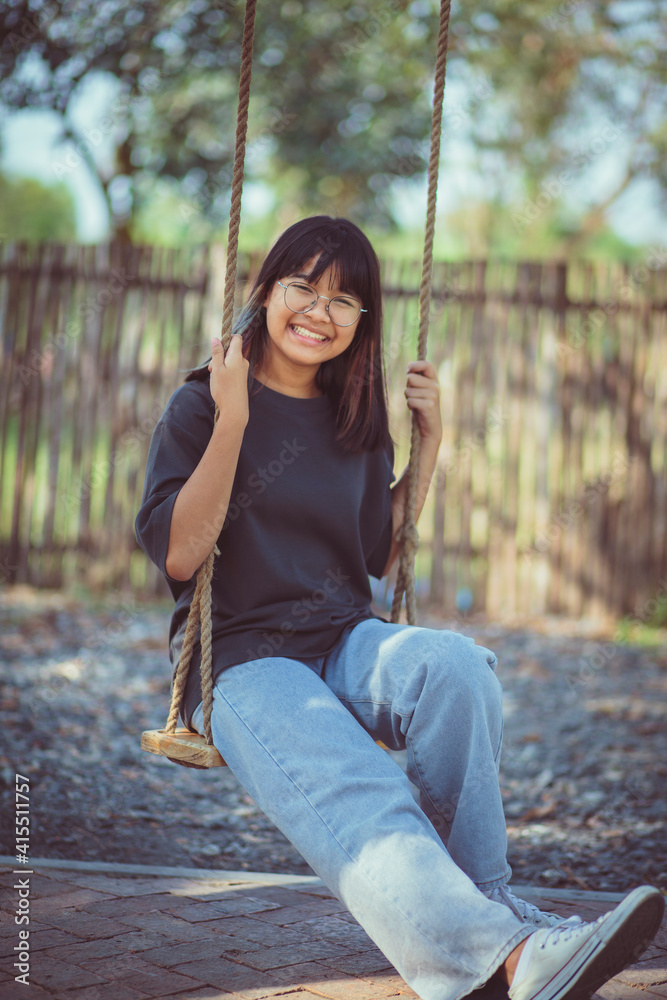 casual style of asian teenager relaxing outdoor casual style of asian teenager relaxing outdoor