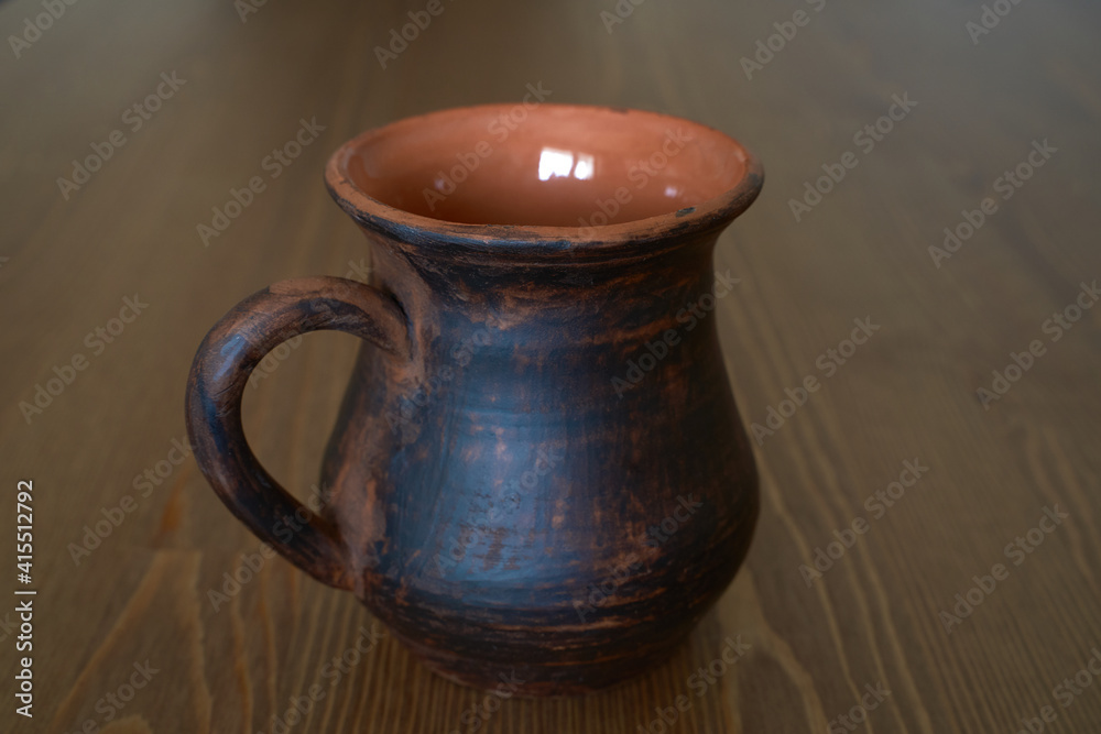 Ceramics, ceramic product mug with your own hands, made on a potter's wheel Ceramics, ceramic product mug with your own hands, made on a potter's wheel