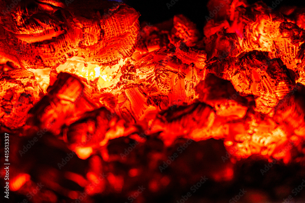 Smoldering coal, glowing embers in the fireplace Smoldering coal, glowing embers in the fireplace