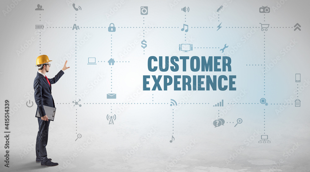 Engineer working on a new social media platform with CUSTOMER EXPERIENCE inscription concept Engineer working on a new social media platform with CUSTOMER EXPERIENCE inscription concept
