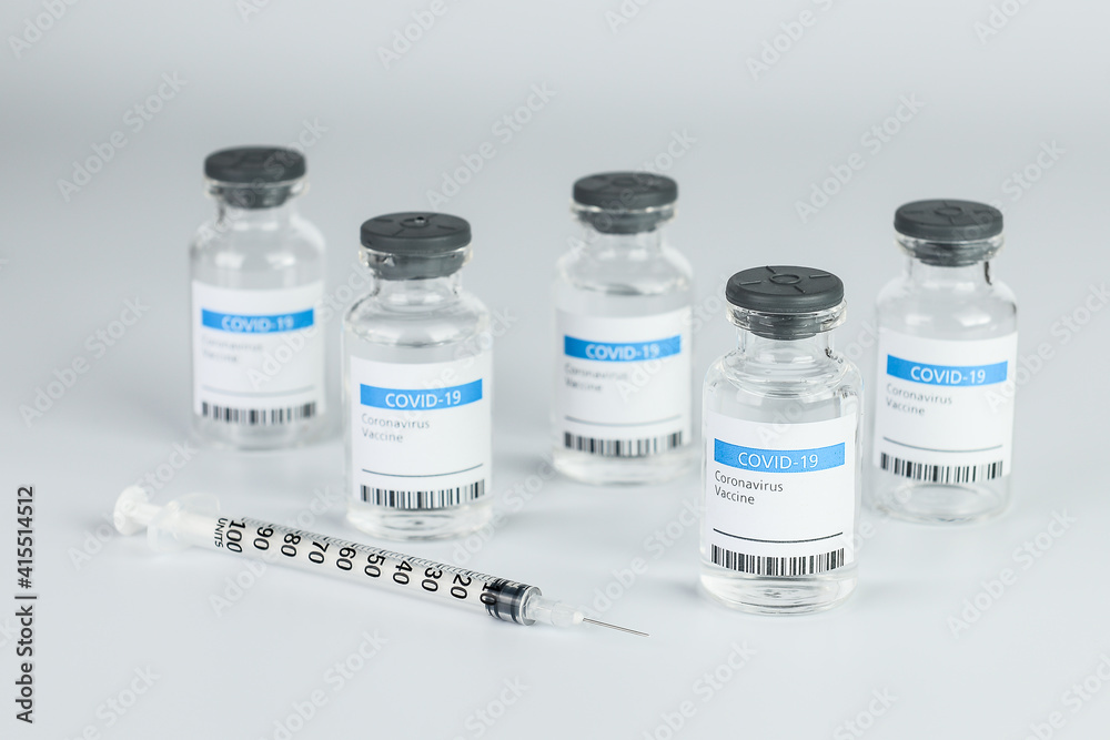 Coronavirus Vaccine bottle Corona Virus COVID-19 Covid vaccines syringe.