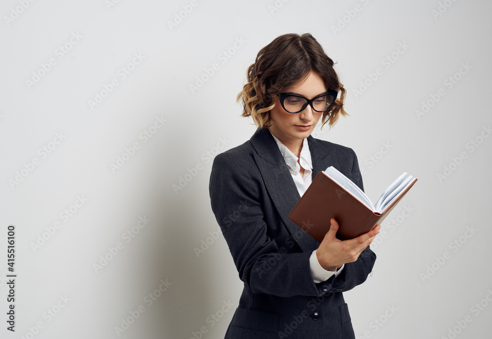 Woman in classic suit short haired glasses model business finance. Woman in classic suit short haired glasses model business finance.