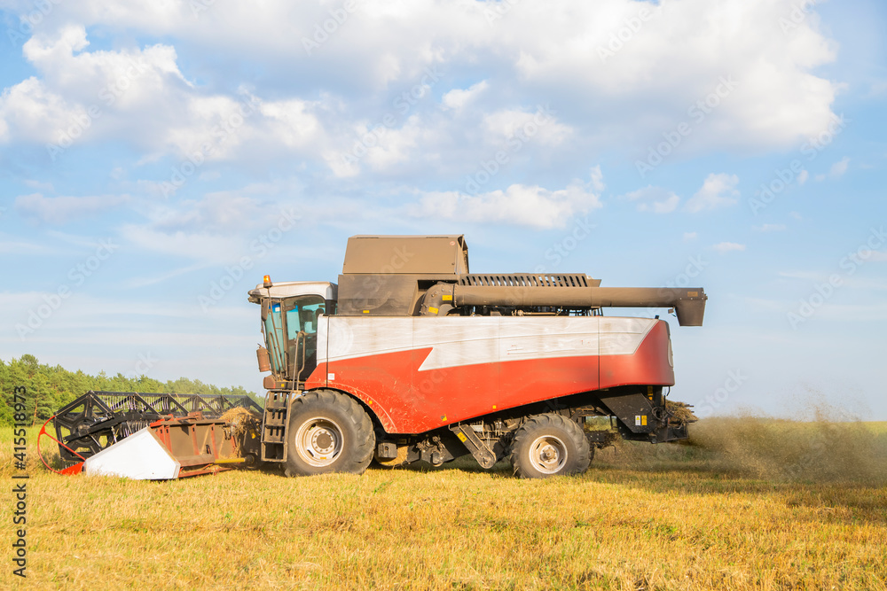 old combine harvester harvests from the field old combine harvester harvests from the field