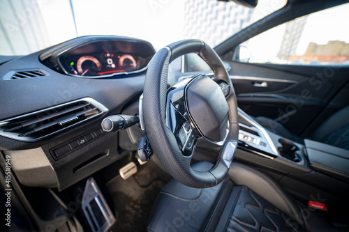 driver's seat and steering wheel of a modern fashionable car © Maria