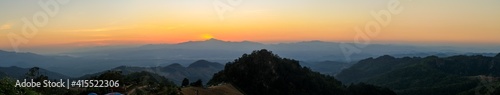 Panorama or panoramic photo of Sunset or evening with mountain hill at Sri Nan National Park Doi Samer Dao Nan Province Thailand, Asia. © Phongsak