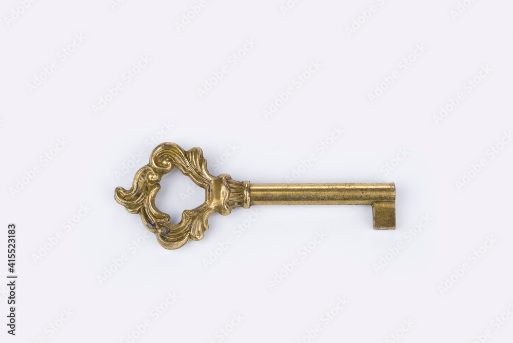 Golden oriental key on a white background Golden oriental key on a white background