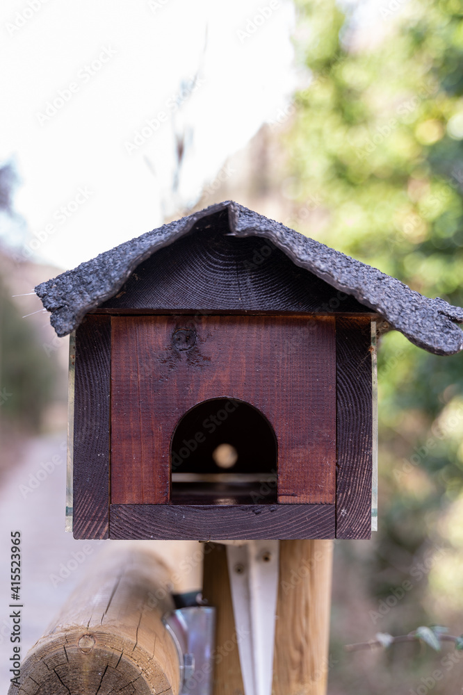 small house to deposit canine fecal bags
small house to deposit canine fecal bags