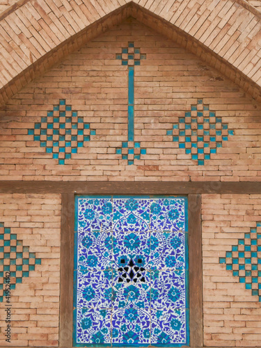 Detail of beautiful brick and ceramic tile medieval islamic architecture at historic Shah Rukn-e-Alam sufi mausoleum and shrine in Multan, Punjab, Pakistan photo