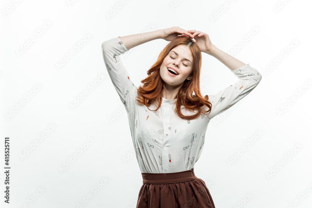 Fototapeta premium pretty woman in shirt gesturing with hands emotions studio