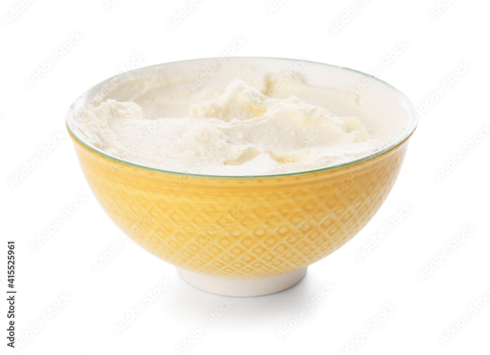 Bowl with tasty cream cheese on white background Bowl with tasty cream cheese on white background