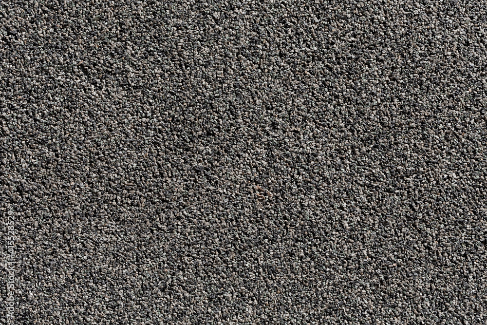 Crushed granite stones wall - close up Crushed granite stones wall - close up