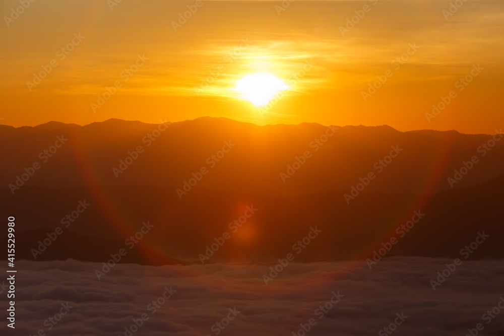 Siurise or sunset over mountain hill forest with circle Lensflare.