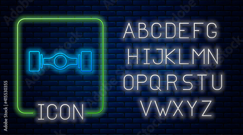 Glowing neon Chassis car icon isolated on brick wall background. Neon light alphabet. Vector.