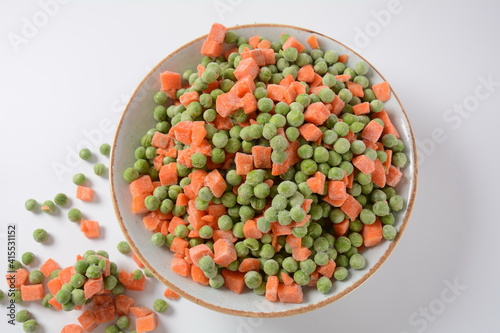 Frozen vegetable mixture of carrots and peas. Healthy food